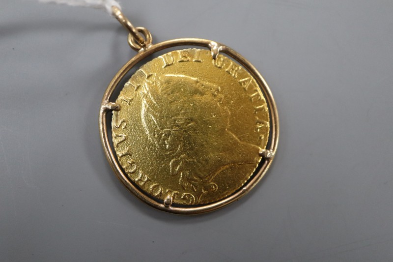 A George III 1788 spade guinea, in later yellow metal pendant mount, gross weight 9.9 grams.